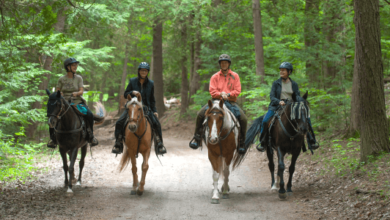 What are the best practices for riding in a group on trails?