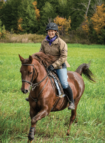 How can riders prepare their horses for encountering wildlife on trails?